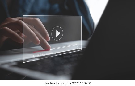 Video marketing concept. Woman playing video content online streaming, running short clip on laptop computer. Marketing technology and advertising for  online business, internet network