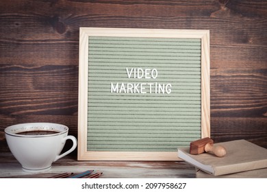 Video Marketing. English Text On A Letter Board. Stationery On A Wooden Table.