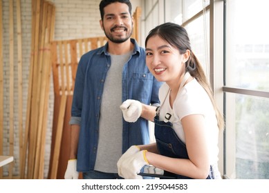 Video Portrait Of Two Happy Carpenters Designing And Planing Wood Products In Workshop, Smiling Couple Of Joiners In Joinery, Woodworking Job Concept