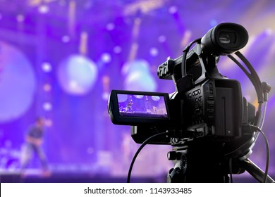 Video production covering event on stage by professional video camera - Powered by Shutterstock
