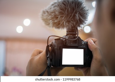 Video Or Professional Digital Mirrorless On Tripod For Camera Recording With Microphone Taking Photograp In Wedding Convention Hall In Live Streaming Event, Seminar Production Equipment.