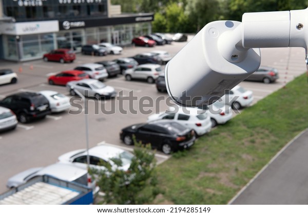 Video\
surveillance camera installed on a vehicle\
parking