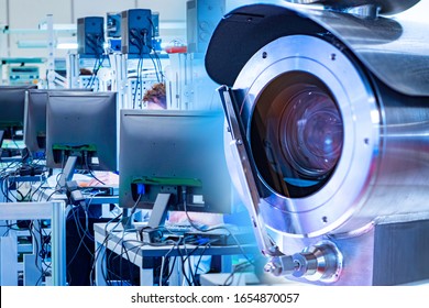 Video surveillance in a modern office. The video camera records what is happening in the room around the clock. Installation of a video surveillance system in an engineering laboratory.