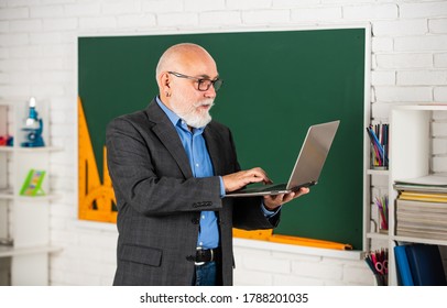 Videoconferencing Keeps Homebound Students Connected. Senior Intelligent Man Teacher Use Laptop. Distant Education Goals. School Education Concept. Useful Knowledge. Education Trends. Online Service.