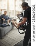 Videographer, cameraman and model in film or media production for shooting, script or brief in studio. Male people, equipment and behind the scenes with technology in cinema, broadcast or advertising