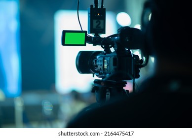 videographer close up, cameraman, man with camera, movie,
 - Powered by Shutterstock