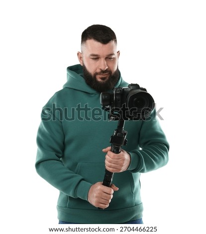 Videographer using gimbal stabilizer with camera on white background