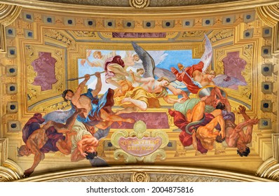 VIENNA, AUSTIRA - JULI 5, 2021: The fresco of St. Michaels war with Fallen angels in Jesuitenkirche - Jesuits church by jesuit Andrea Pozzo from begin of 18. cent.
