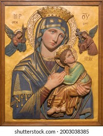 VIENNA, AUSTIRA - JUNI 24, 2021: The relief of Madonna (Our Lady of Perpetual Help) in the Pfarrkirche St. Thekla church by unknown artist.