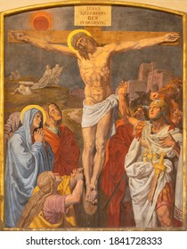 VIENNA, AUSTIRA - OCTOBER 22, 2020: The fresco of Crucifixion as part of Cross way station in the church of St. John the Nepomuk by Josef Furlich (1844 - 1846).