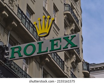 Vienna, Austria - 03-20-2022: Low Angle View Of The Logo Of Swiss Luxury Watch Designer Rolex SA On The Facade Of An Old Building In The Historic Center Of Vienna Austria, At Kärntner Straße.