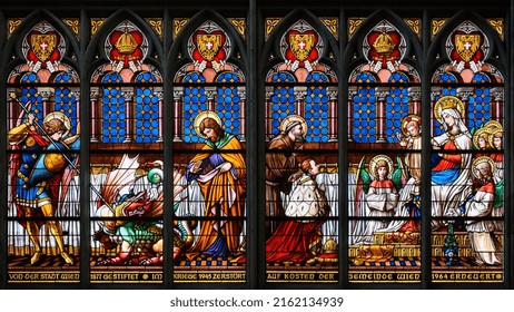 Vienna, Austria. 2020-07-29. Stained-glass Window: Young Emperor Franz Joseph Kneeling In Front Of The Virgin Mary And Jesus. Votivkirche – Votive Church, Vienna.