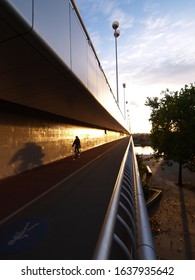 Vienna, Austria, 24 Oct 2005, Cyclist On Bridge Reichsbrücke Crossing The Danube River