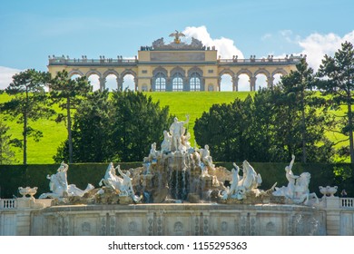 Vienna, Austria - April 2018: Gloriette pavilion and Neptune fountain in Schonbrunn park
