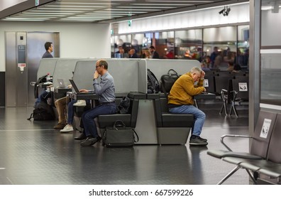 VIENNA, AUSTRIA - APRIL 6, 2017. People Working At Laptops In The Free Wifi Area Of The Airport Schwechat. Vienna, Austria.