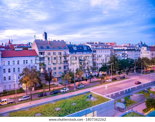 VIENNA, AUSTRIA - AUGUST\
24, 2020: View on the busy afternoon of Vienna during sunset on a\
summer day..