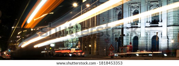 VIENNA, AUSTRIA - AUGUST 27, 2019. Vienna night\
with traces of lights from\
vehicles