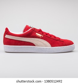 red pumas with bow