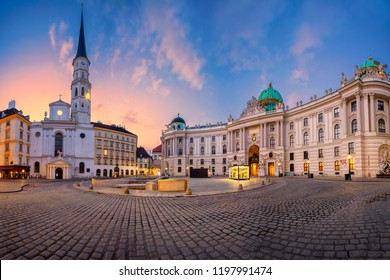 Vienna, Austria. Cityscape image of Vienna, Austria with St. Michael's Church and located at St. Michael Square during sunrise.  