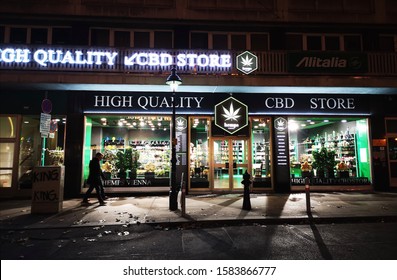 Vienna, Austria: December 01, 2019: High Quality CBD Store Window At Night With Logo. Selling Hemp And CBD Products For Natural Medicinal Use - Alternative Medicine. 