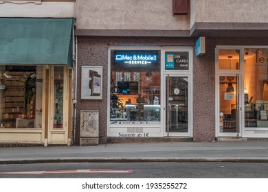 Vienna, Austria - Feb 7, 2020: Mac Mobile Repair Store In Josefstadt Street In City Center In Winter