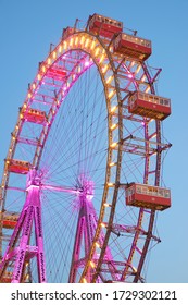 VIENNA, AUSTRIA - MAY 11, 2020: Vienna, Austria - June 25, 2019: Tourists Visiting Ferris Wheel Of Vienna Prater Park. Place Where Scenes From The Movie The Third Man Were Filmed.