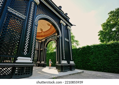 Vienna, Austria - May 17, 2022: Baby Girl Under Wooden Arbor Arch At Schonbrunn Palace In Vienna, Austria.