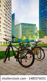 Vienna, Austria - May 20, 2019: Bicycles Parked At Modern Apartment Residential And Flat Building Exterior, Vienna, Austria. New Luxury House And Home Complex. City Architecture. Bikes At Condominium