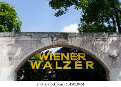 VIENNA, AUSTRIA - MAY, 22: Signboard Viennese Waltz On The Arch Of The Entrance Of Viennese Building On May 22, 2018