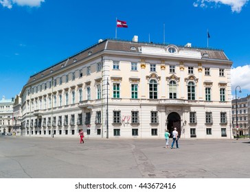 VIENNA, AUSTRIA - MAY 31, 2016: Ballhaus square with people and Federal Chancellery or BKA, Bundeskanzleramt govenment building in inner city of Vienna, Austria