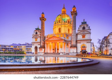 Vienna, Austria. Night view of Karlskirche Baroque church in Wien. Its impressive dome make it a popular.