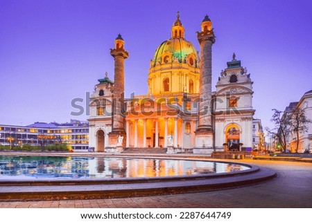 Vienna, Austria. Night view of Karlskirche Baroque church in Wien. Its impressive dome make it a popular.