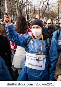 Vienna, Austria - November 20 2021: Anti-Vax Covid-19 Demonstrator Nurse Or Health Care Worker At A Protest, Rally Or Demonstration.