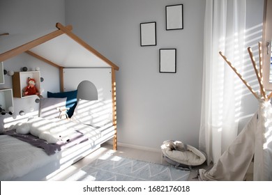 VIENNA/ AUSTRIA - NOVEMBER 22, 2019: Scandinavian style children's room design. Room in the sun. Modern design of a children's room. Neutral baby room interior