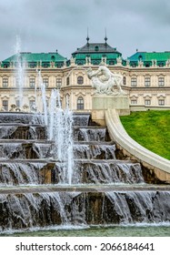 Vienna, Austria - October 06, 2021: Magnificent cascading fountains and sumptuous marble antique statues in the park of the Belvedere Palace in Vienna, the capital of Austria