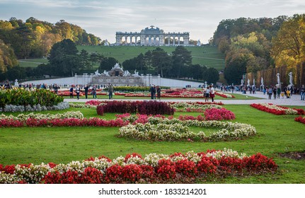 Vienna, Austria - October 26,,2017: The Glorietta Located In Schönbrunn Palace Park (Schloss Schönbrunn) Located In Vienna, Austria. Panoramic Evening View At Sunset. Sharpness Is In The Foreground.