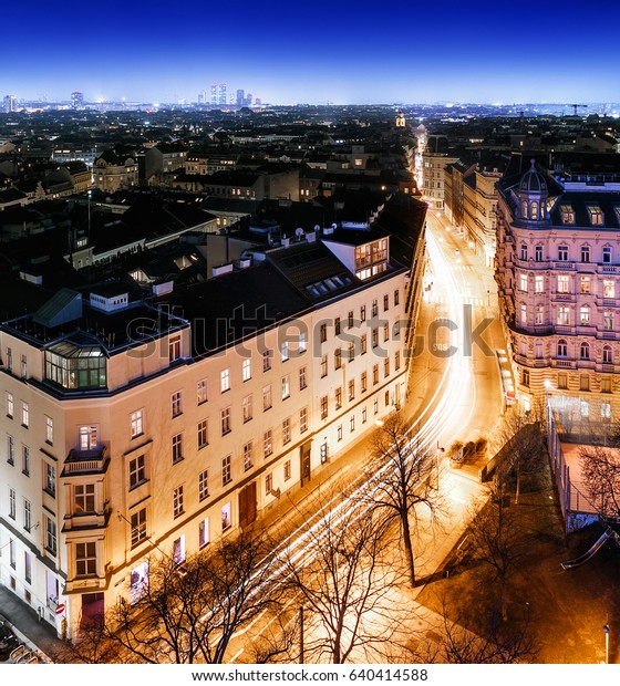 Vienna night city\
with traffic, aerial\
view