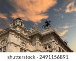 Vienna, Vienna state opera house at sunset, known as "Wiener Staatsoper" in German, Wien, side angle, close-up angle