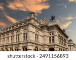 Vienna, Vienna state opera house at sunset, known as "Wiener Staatsoper" in German, Wien, side angle