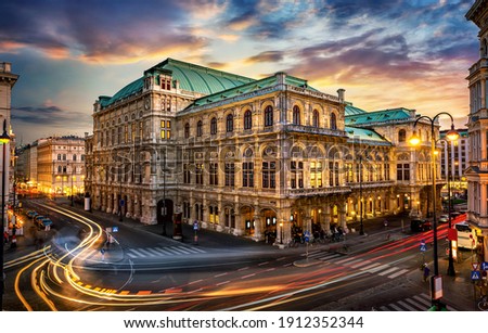 Vienna State Opera. Veinna, Austria. Evening view. The historic opera house is a symbol and landmark of the city of Vienna.  Panoramic view, long exposure. 