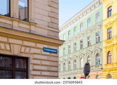 Vienna street corner with traditional colorful pastel baroque buildings. Beautiful Austrian city capital. Adamsgasse intersection with Hetzgasse street in the historic center of Vienna.