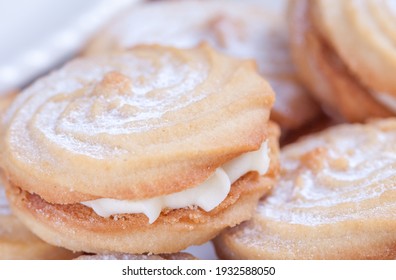 Viennese whirls cream cakes.  A close-up view of shortcrust pastry cakes with cream filling. Shallow depth of field - Shutterstock ID 1932588050