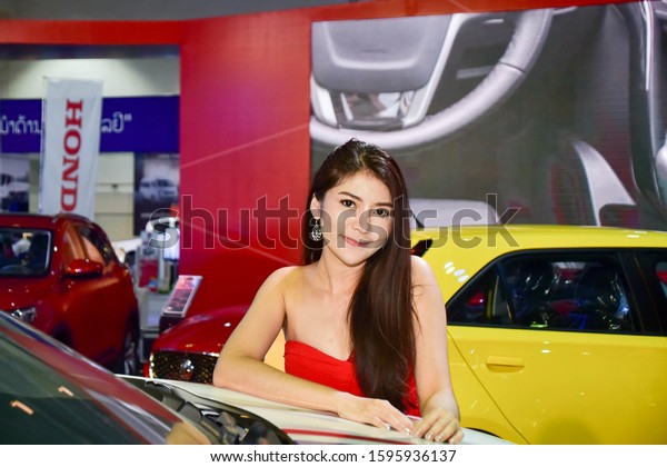 Vientiane, Lao - Feb 22 - Mar 02\
2019: Unidentified Females Presenter at Booth in the Vientiane\
Motor Show 2019 on Feb 22 - Mar 02 2019 in Vientiane, Lao\
PDR.