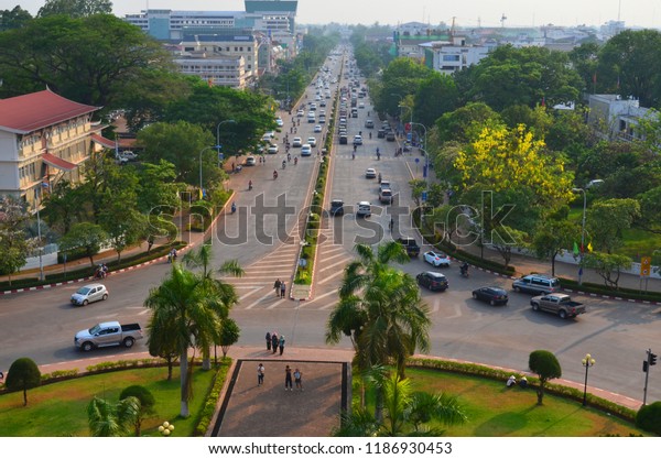 VIENTIANE LAOS APRIL 2: Bird eye view of the traffic\
on Lane Xang avenue from the Patuxai ( arc de Triomphe on april 2\
2013 in Vientiane\
Laos