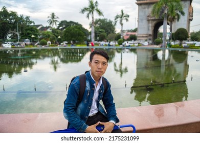 VIENTIANE, LAOS - OCTOBER 25: Unidentified Laos teenage smile for take a photo at Patuxai Monument, is a war monument in the centre of city on Oct 25, 2016