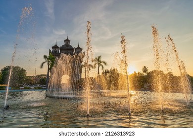Vientiane Laos, sunset city skyline at Patuxai (Patuxay) and fountain the most famous landmark in Vientiane