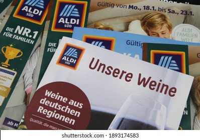 Viersen, Germany - January 13. 2021: Closeup Of Weekly Printed Advertising Inserts From German Aldi Discounter With Focus On Catalogue With German Wine Selection