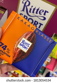 Viersen, Germany - July 9. 2020: View On Isolated Packet Ritter Sport Chocolate Bar In Shelf Of German Supermarket (focus On Center)