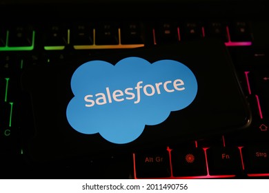 Viersen, Germany - June 1. 2021: Closeup of phone screen with logo lettering of salesforce on computer keyboard (focus on center of lettering)