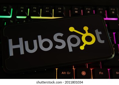 Viersen, Germany - June 1. 2021: Closeup of phone screen with logo lettering of  hubspot on computer keyboard (focus on center of lettering)